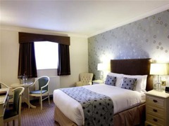 Hotel bedroom decorated by Anston Decorators Limited